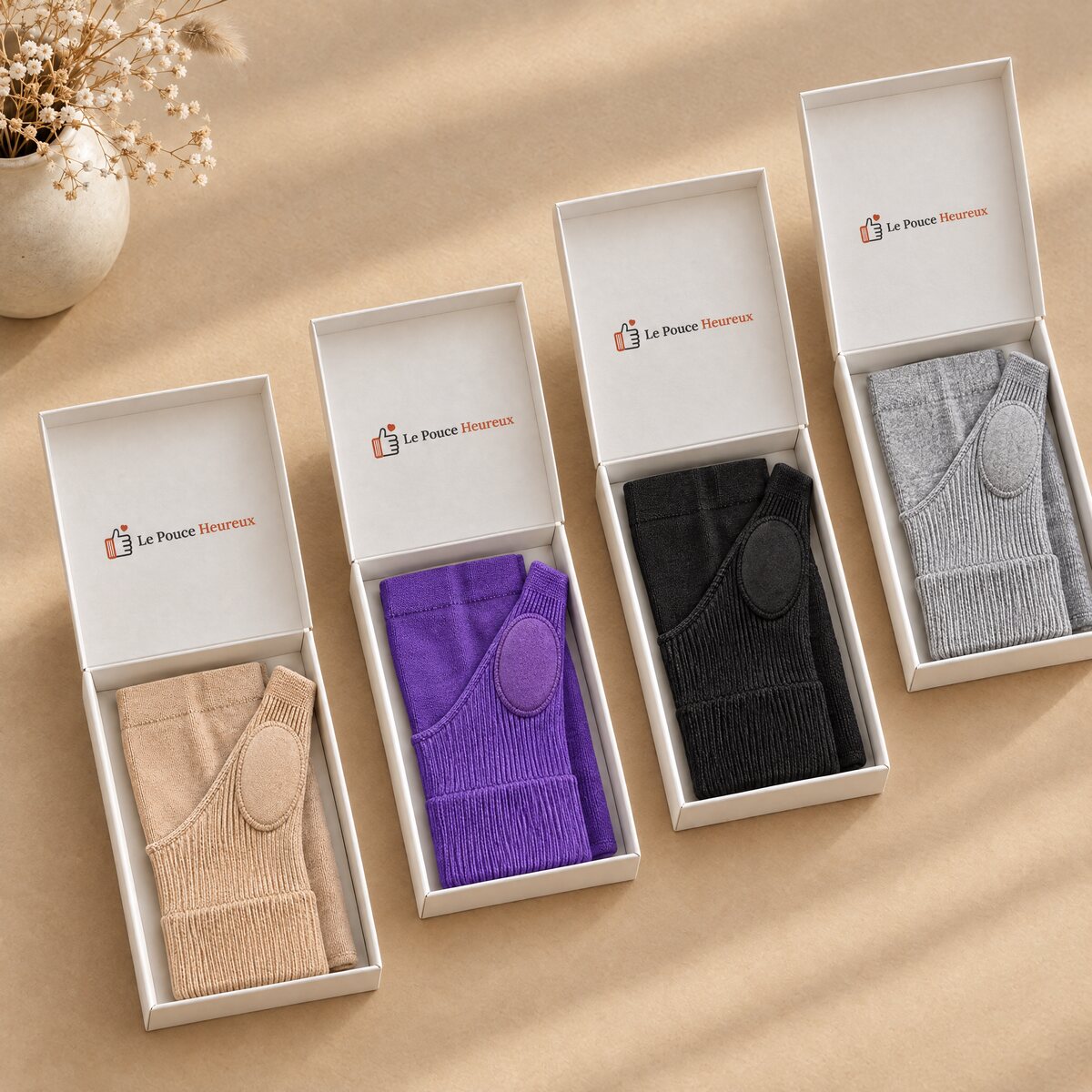 Les quatre coloris : Beige, Violet, Noir et Gris.